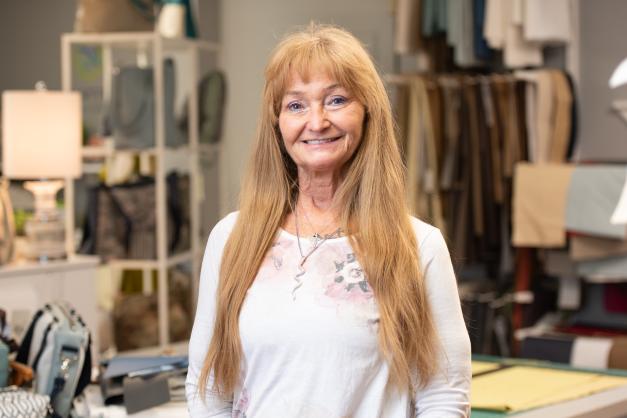 Lois smiling in the cutting area