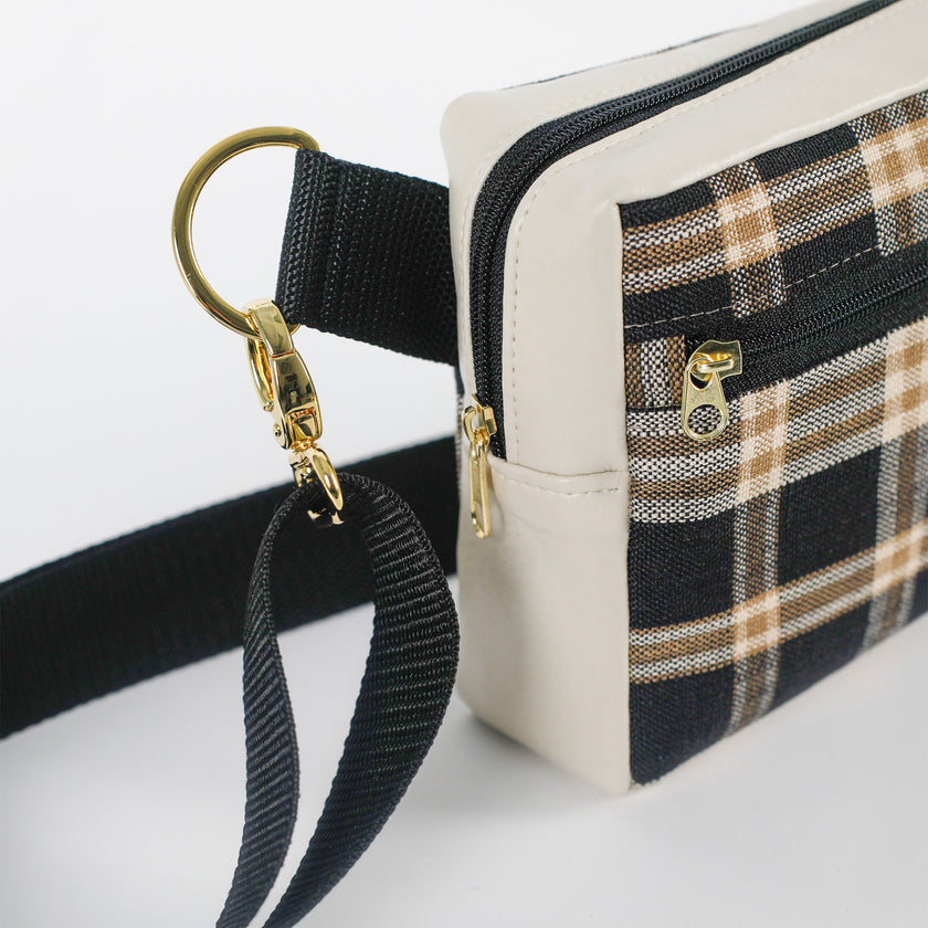 Errand bag with plaid pattern and beige strap on a white background