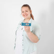 Person holding a blue key clip against a white background