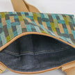 Denim interior of the geometric crossbody pouch