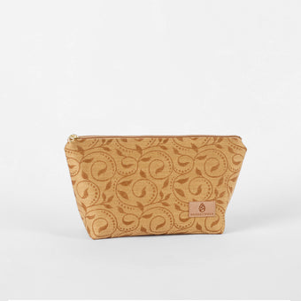 Brown ivy patterned fabric makeup kit on a white background