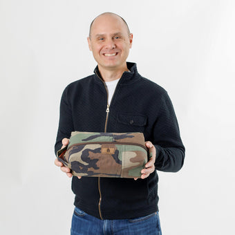 Woodland Camo Toiletry Kit held by Ben