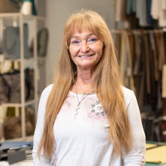 Lois smiling in the cutting area
