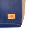 A tan label on a southwest tote on a white background 