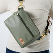 A close-up of the green luxury leather alternative errand bag named after Tasha