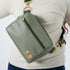 A close-up of the green luxury leather alternative errand bag named after Tasha