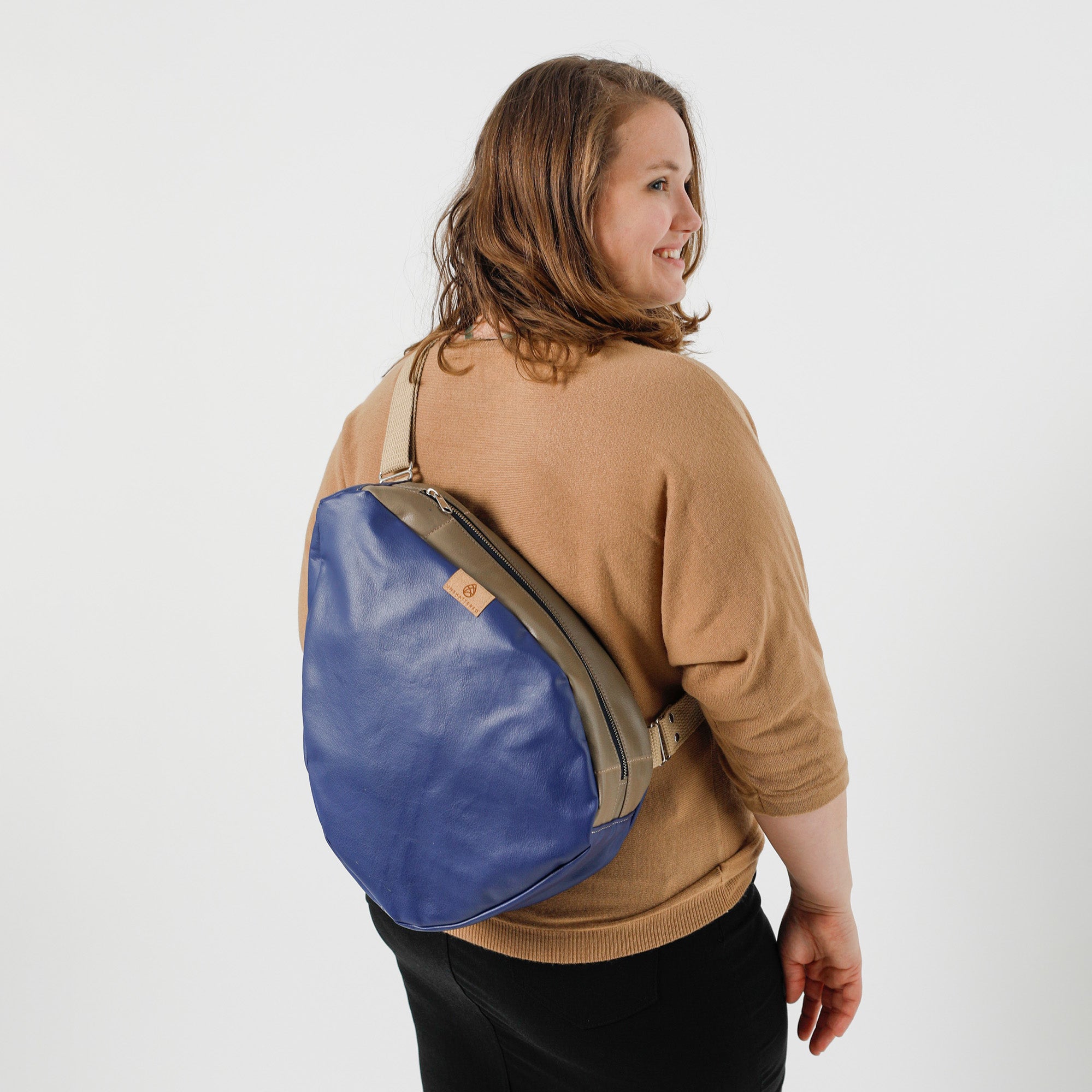 Teardrop sling bag on sale