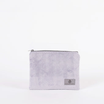 Light Purple Textured pouch with a zipper on a white background