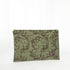 A green floral zip pouch with gold-tone hardware, closed and laid flat on a surface.