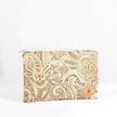A large zip pouch with a paisley pattern in shades of teal, white, and brown, featuring a neutral fabric liner and gold-tone hardware named after Ariana.