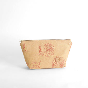 Beige makeup kit with floral patterns on a white background