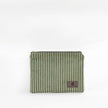Striped green plush zippered pouch on a white background