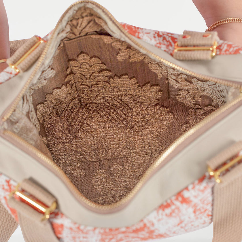 Interior shot of Burnt Orange Cone. Handbag 