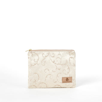 Beige zippered pouch with floral pattern and brand logo on a white background named after Kathleen