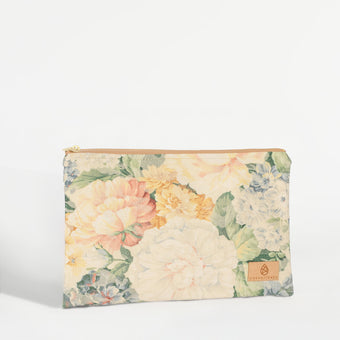 A floral print Bella large zip pouch with gold-tone hardware, upcycled manufacturing fabric, and a neutral fabric liner.