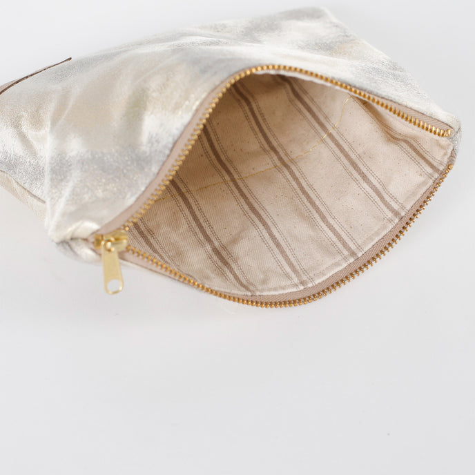 Beige zip  pouch with tan zipper on a white background named after Billy