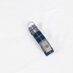 A vintage blue-grey plaid keychain with a silver-tone ring, handcrafted from 1955 Mercedes-Benz upholstery.