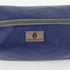 A gray Unshattered label on blue luxury leather alternative toiletry kit named after Cherisse