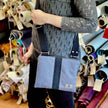 lifestyle shot of dress gray crossbody