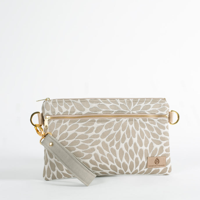 platos petal design 3-in-1 wristlet  with a green luxury leather alternative strap