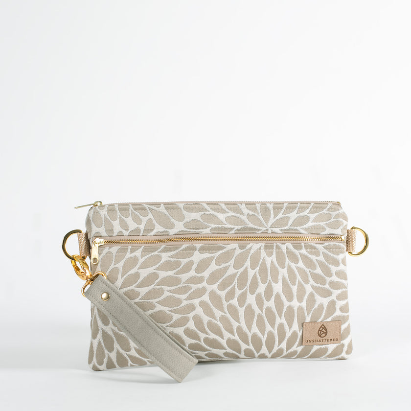 platos petal design 3-in-1 wristlet  with a green luxury leather alternative strap