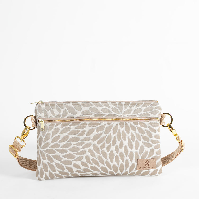 This platos petal design 3-in-1 bag with a gold hardware belt bag style