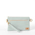 George 3-in-1 Bag handcrafted from light blue wipe-clean material with a light blue wristlet strap