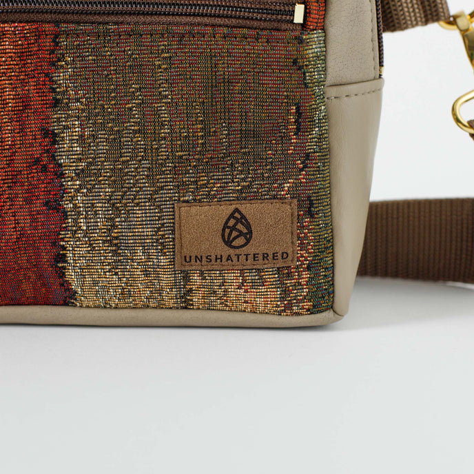 A brown label on a fall colored errand bag 