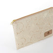 Beige pouch with gold zipper and intricate pattern on a white background named after Kathleen 