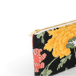 Gold-toned zipper on upcycled floral-patterned fabric pouch named Felicia 