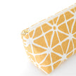 Gold-tone zipper on the Isabel Makeup Bag handcrafted from upcycled yellow geometric patterned fabric