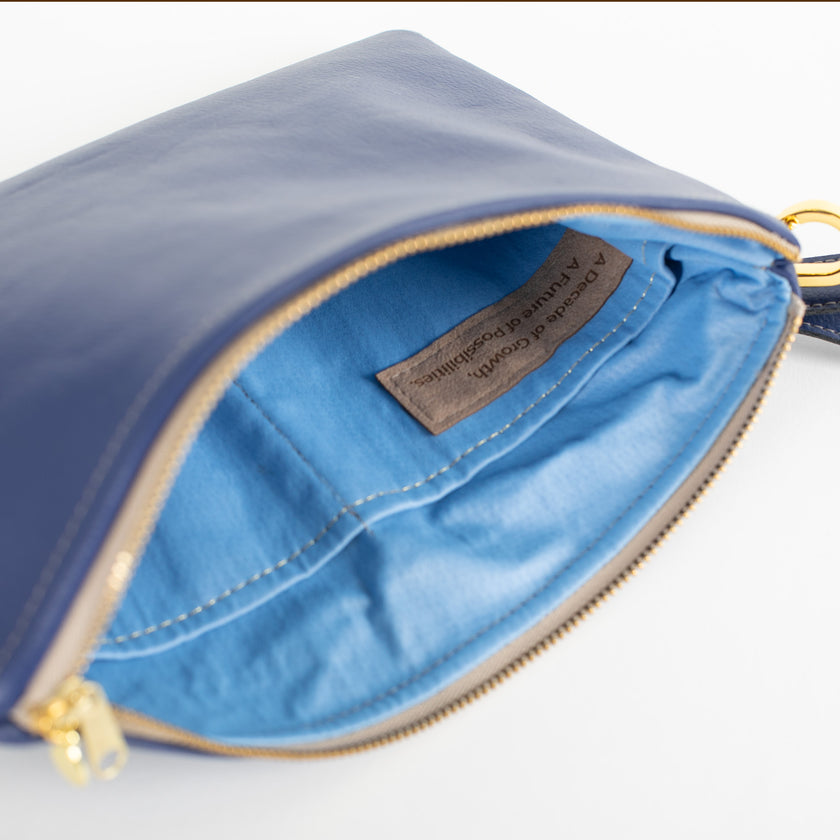 A light blue interior with a tan label saying A Decade of Growth, A Future of Possibilities. 