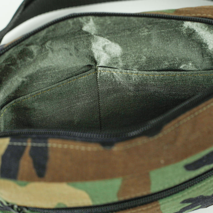 A green shiny interior fabric on woodland camo errand bag 
