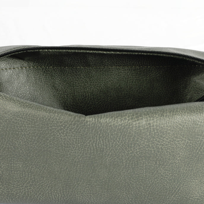 Interior of a gray luxury leather alternative toiletry bag