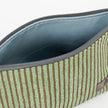 Green striped makeup kit open to show blue luxury leather alternative interior