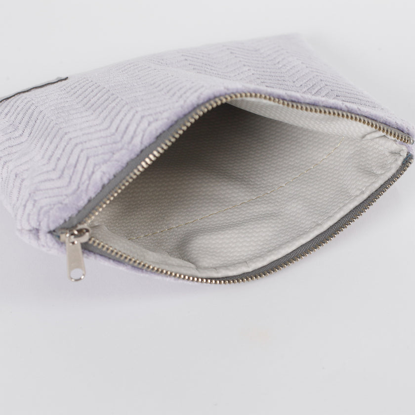 Light gray wipe clean interior zip pouch named after Jaimilee