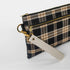 Plaid pouch with gold zipper and beige strap on a white background named after Jenny
