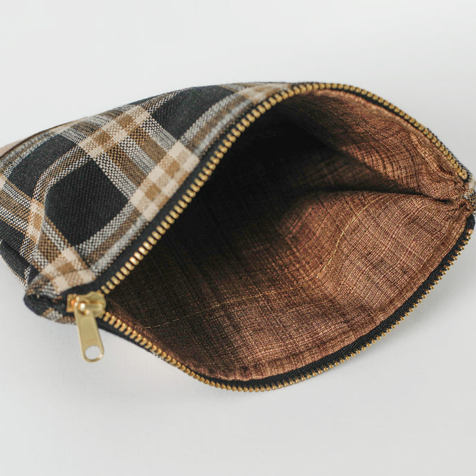 Light brown interior with plaid pattern on a white background named after Jeyana