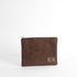 Brown suede pouch with a brand logo on a white background