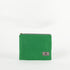 A green zip pouch with a gray Unshattered label on a white background