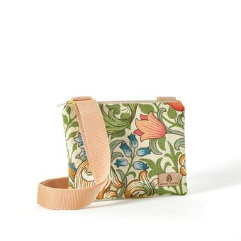 A floral crossbody pouch with a vibrant pattern and a beige strap, handcrafted from upcycled material, bag named after Leanna