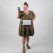 Lifestyle shot of belt bag hands free