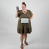 Lifestyle shot of belt bag hands free