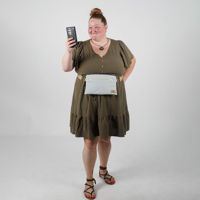 Lifestyle shot of belt bag hands free