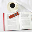 Lifestyle shot of red bookmark 