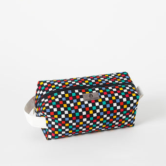 Multicolored checkered toiletry kit with a brand label on a white background named after Lyddin 