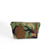 A makeup bag handcrafted from upcycled woodland camouflage uniforms with a brown label and gold tone zipper