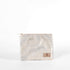Marble-patterned fabric pouch handcrafted from upcycled materials and named in honor of Billy on a white background 