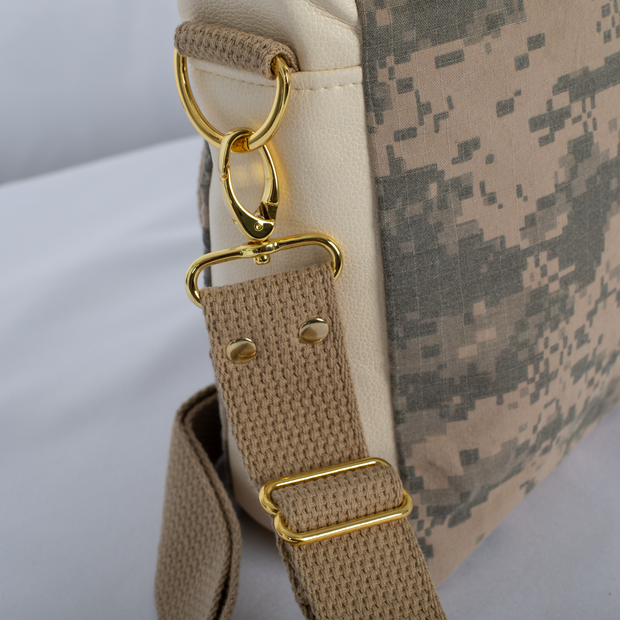 Detail shot of Cream Army Handbag