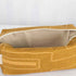 A cream luxury leather alternative material on a yellow line design toiletry kit 